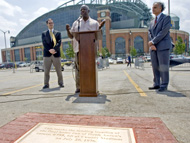 Hank Aaron speaks outside Miller Park, where he received a plaque. 